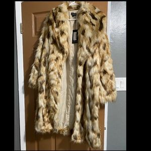 Brand new faux fur coat size 10 never worn tags attached